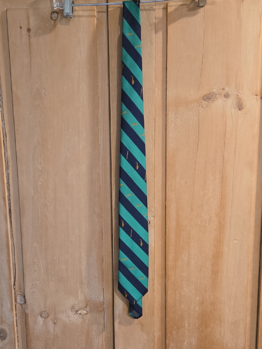 Striped Green and Navy Men’s Tie with Gold Musical Instrument Motif